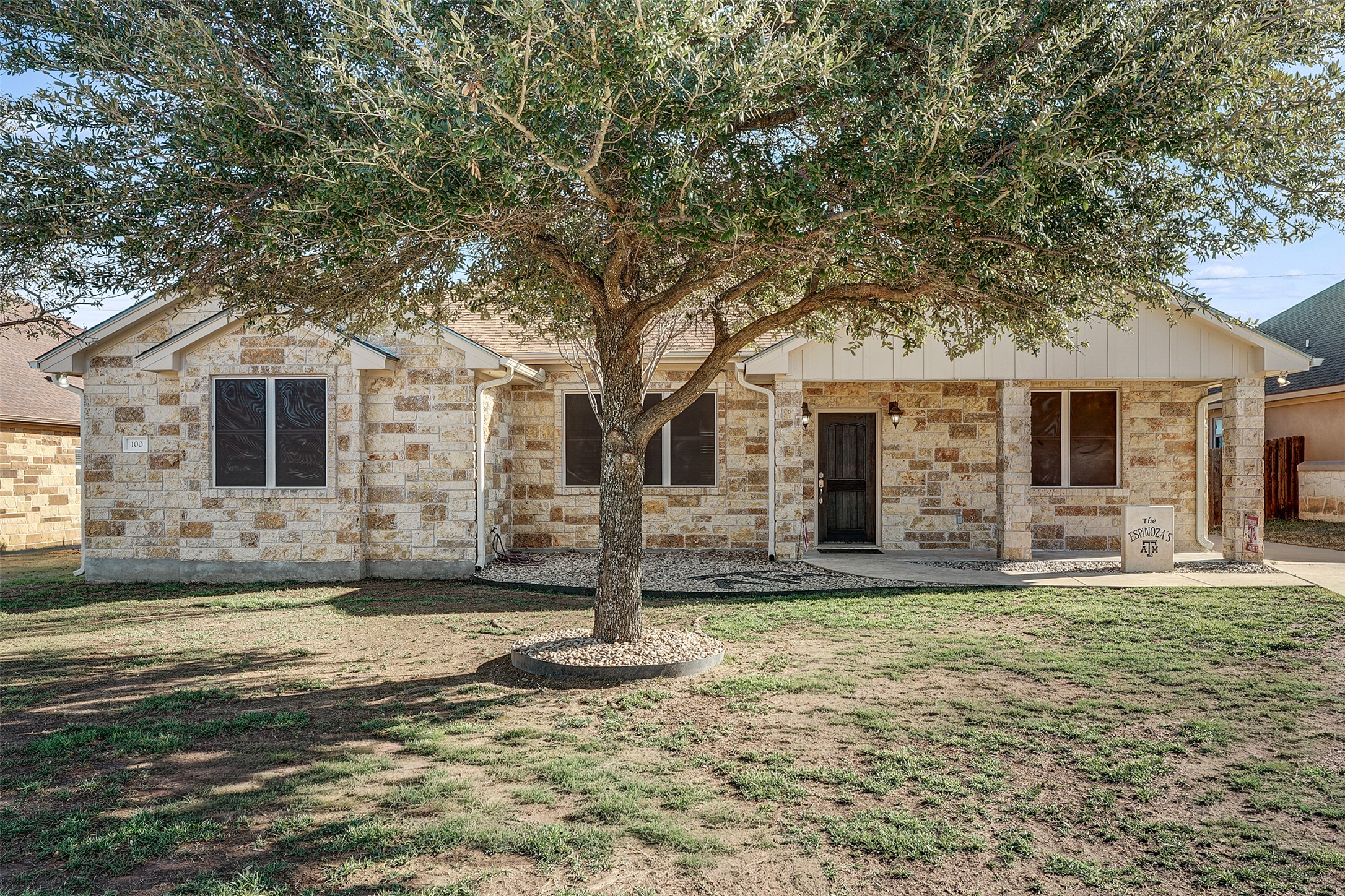 100 Magan Lane Jarrell, TX 76537 - Photo 2 of 32 a front view of a house with a yard