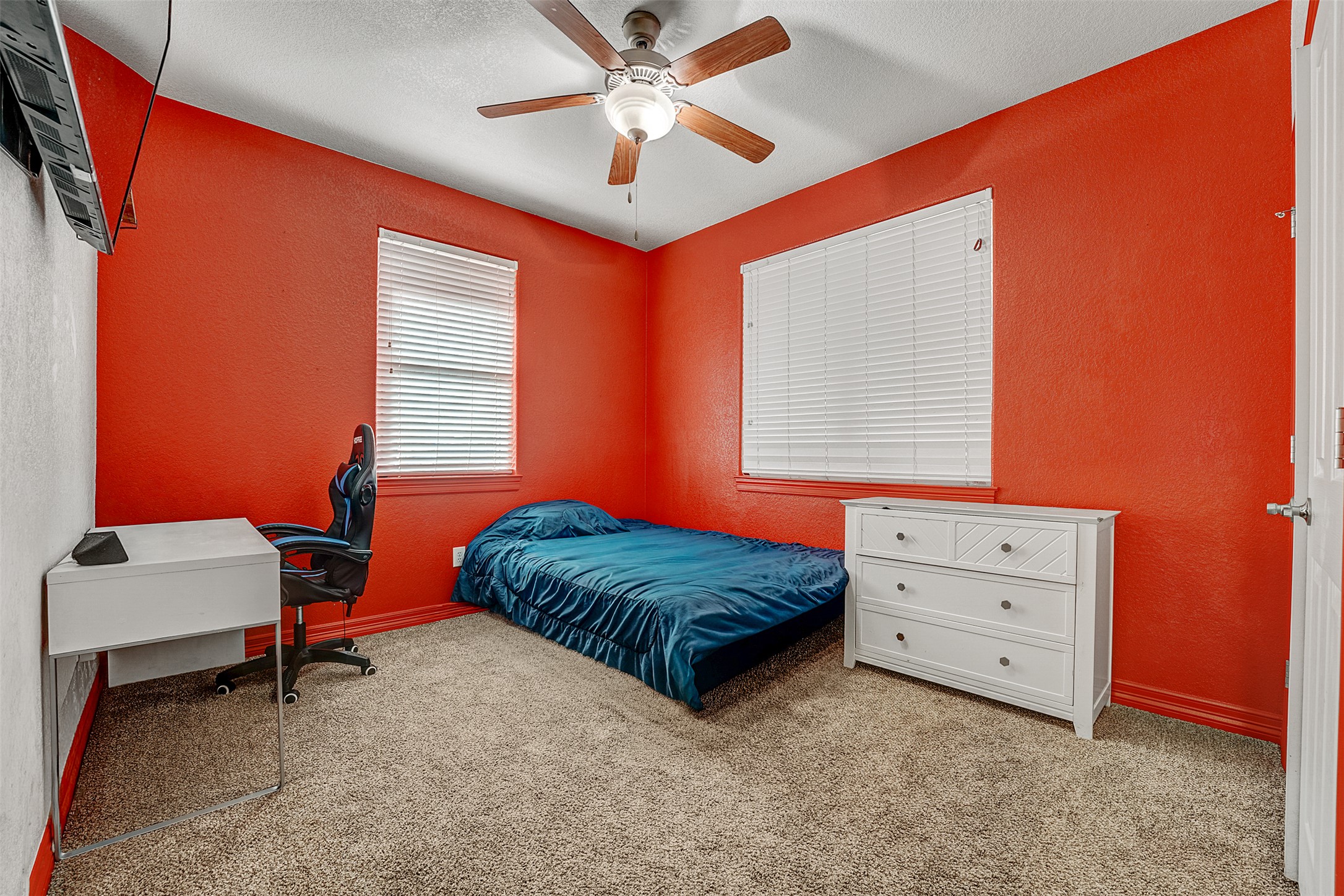 100 Magan Lane Jarrell, TX 76537 - Photo 22 of 31 a bedroom with a bed and a window