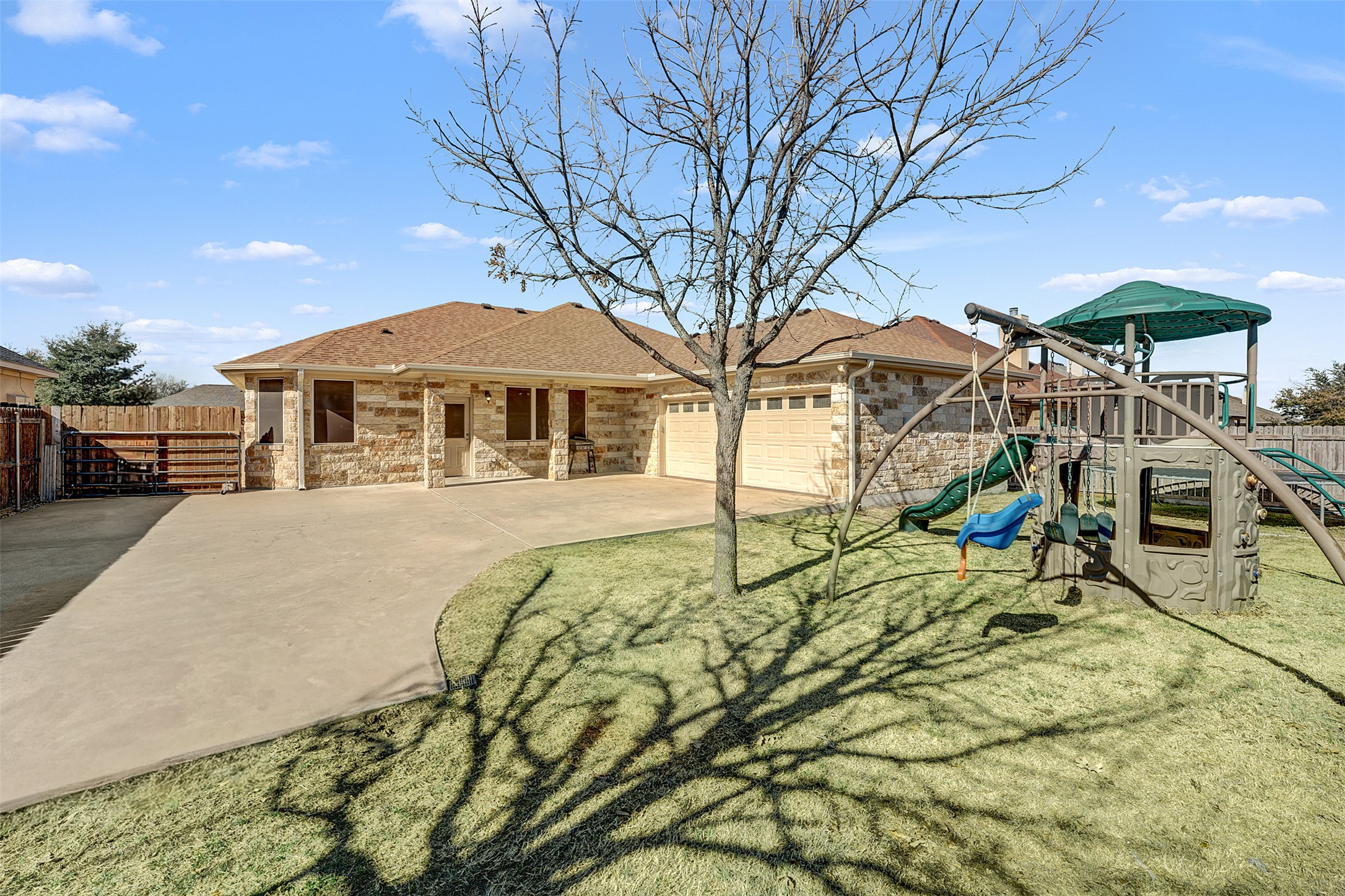 100 Magan Lane Jarrell, TX 76537 - Photo 29 of 32 a view of a house with a yard