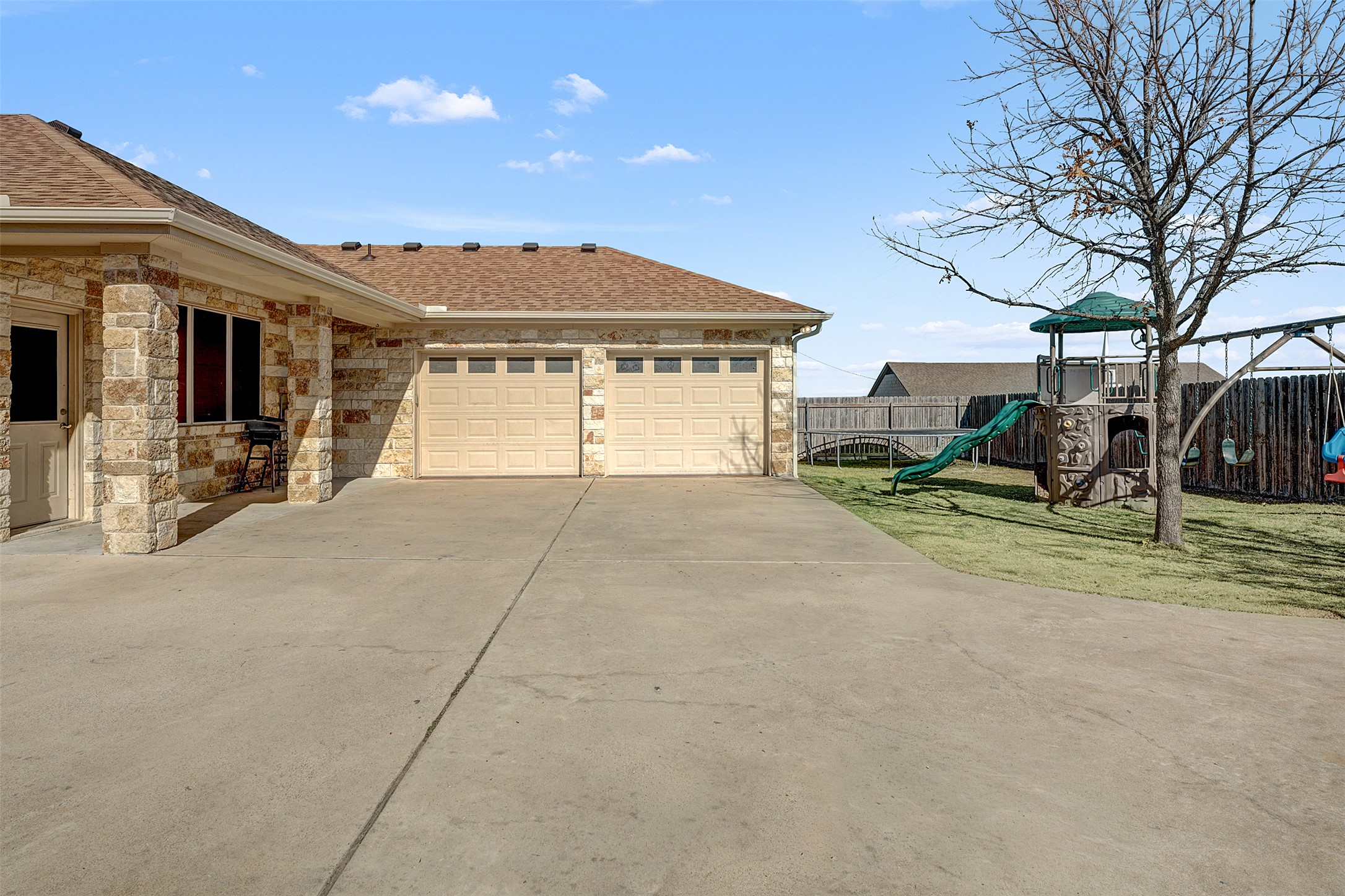 100 Magan Lane Jarrell, TX 76537 - Photo 30 of 32 a view of a house with a outdoor space