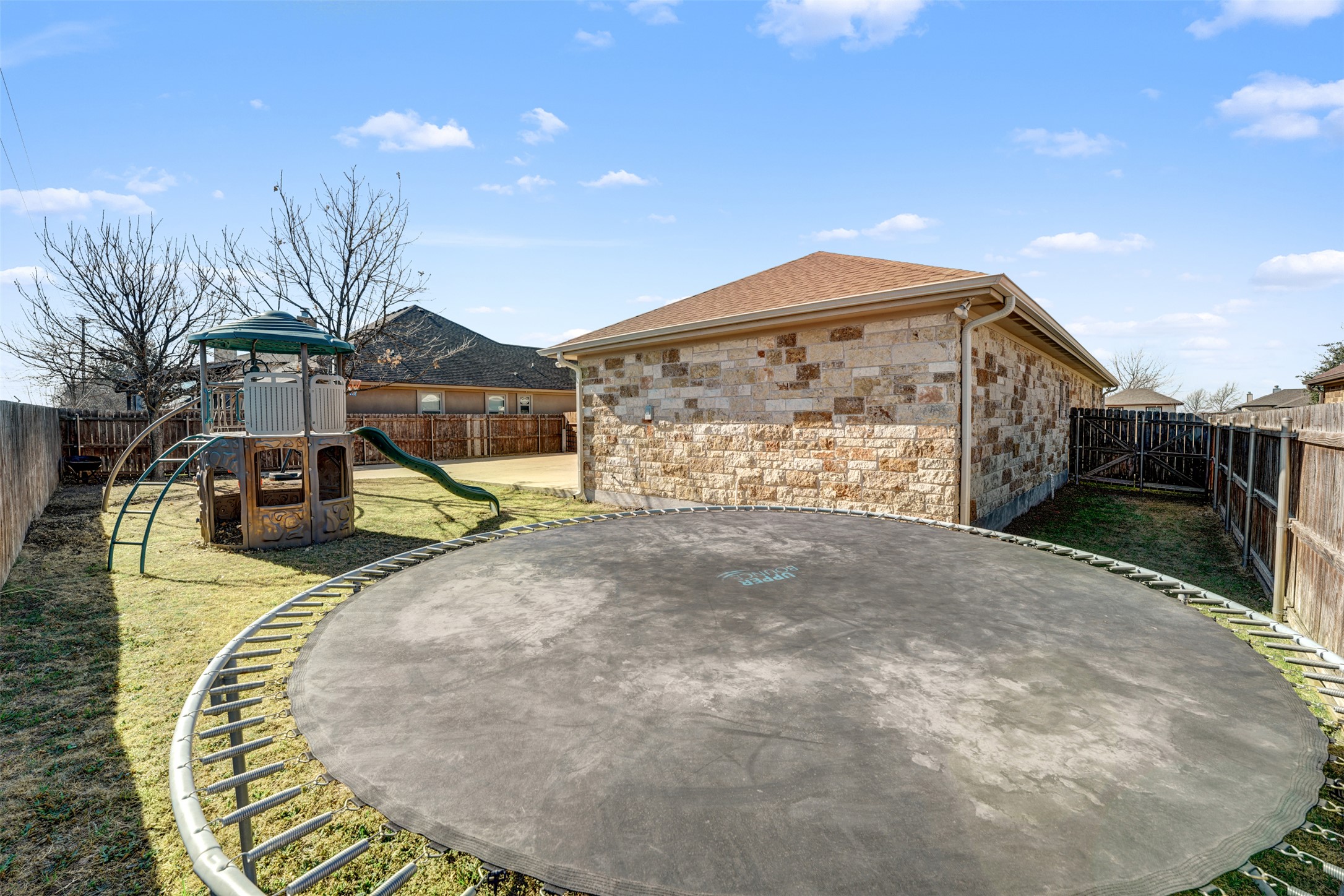 100 Magan Lane Jarrell, TX 76537 - Photo 31 of 32 a view of a house with a outdoor space