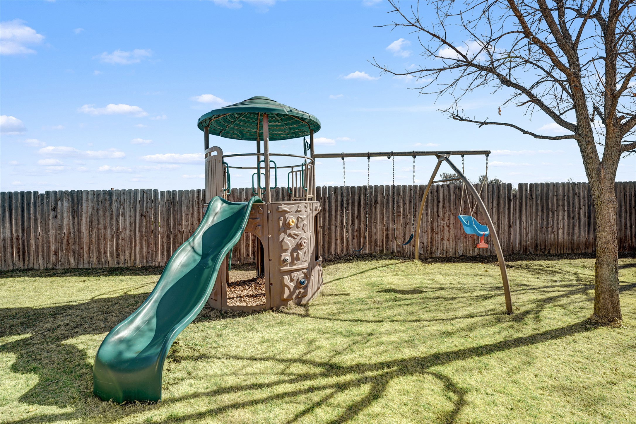 100 Magan Lane Jarrell, TX 76537 - Photo 32 of 32 a backyard of a house