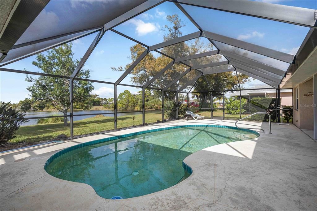 222 Sportsman Road Rotonda West, FL 33947 - Photo 3 of 54 a view of a swimming pool