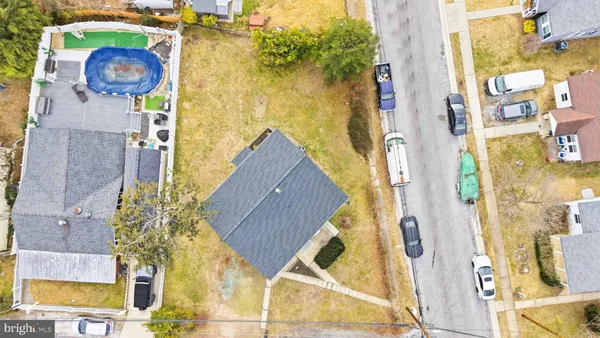 view of entryway and hall with wooden floor