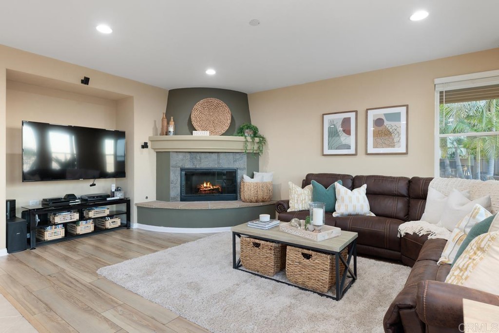 979 Canyon Heights San Marcos, CA 92078 - Photo 22 of 58 a living room with furniture and a flat screen tv