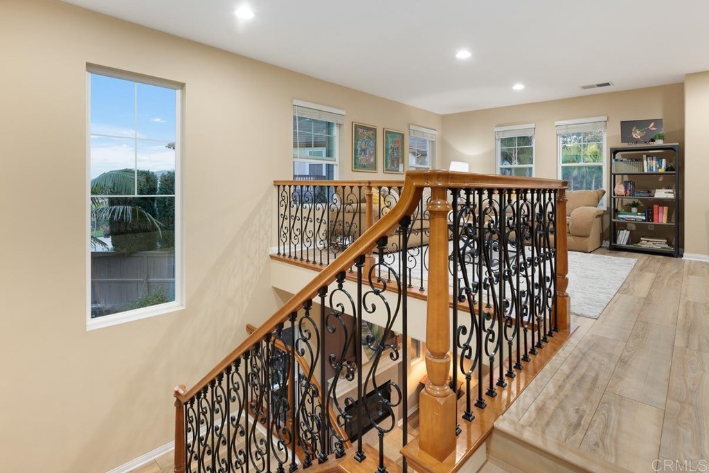 979 Canyon Heights San Marcos, CA 92078 - Photo 24 of 58 a view of entryway and hall with wooden floor