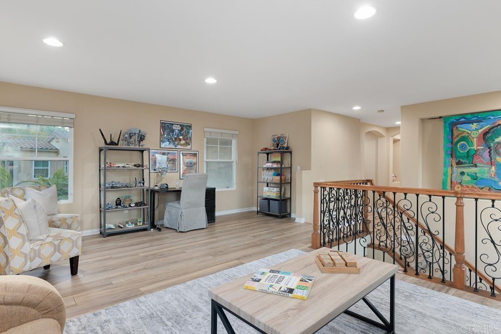 979 Canyon Heights San Marcos, CA 92078 - Photo 26 of 58 a living room with furniture and wooden floor