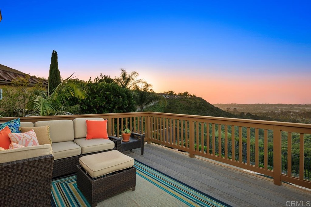 979 Canyon Heights San Marcos, CA 92078 - Photo 28 of 58 a balcony with wooden floor and fence
