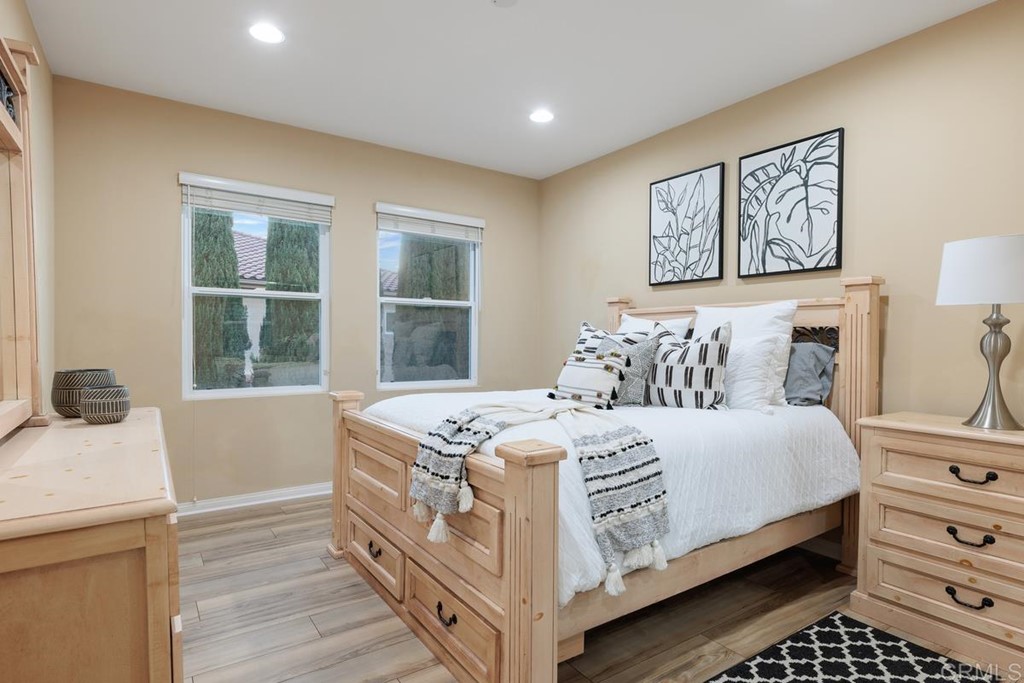 979 Canyon Heights San Marcos, CA 92078 - Photo 34 of 58 a bedroom with a bed and a window