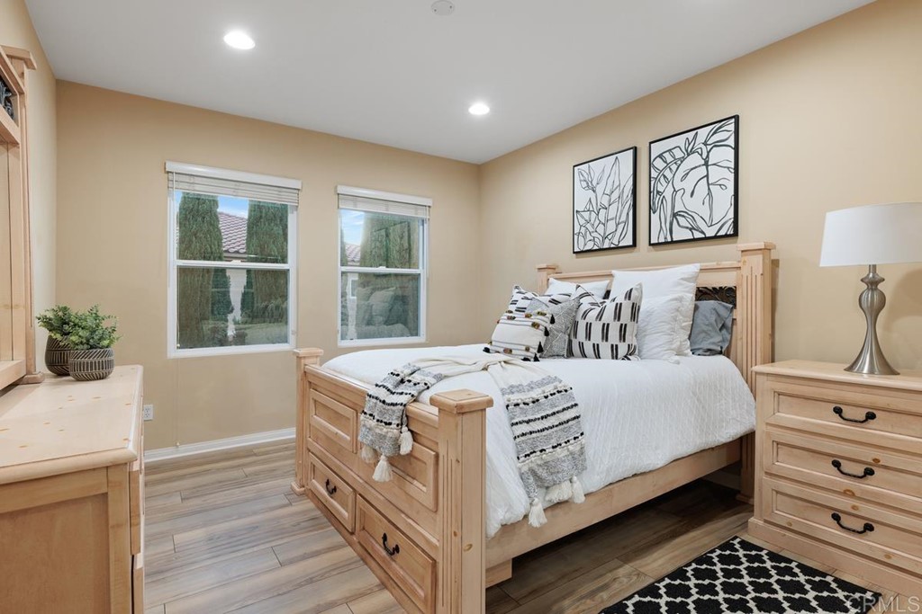 979 Canyon Heights San Marcos, CA 92078 - Photo 35 of 58 a bedroom with a bed and a window