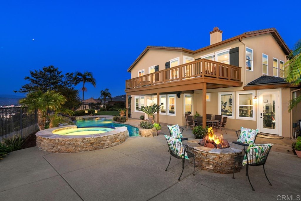 979 Canyon Heights San Marcos, CA 92078 - Photo 4 of 58 a view of a house with a yard patio and fire pit