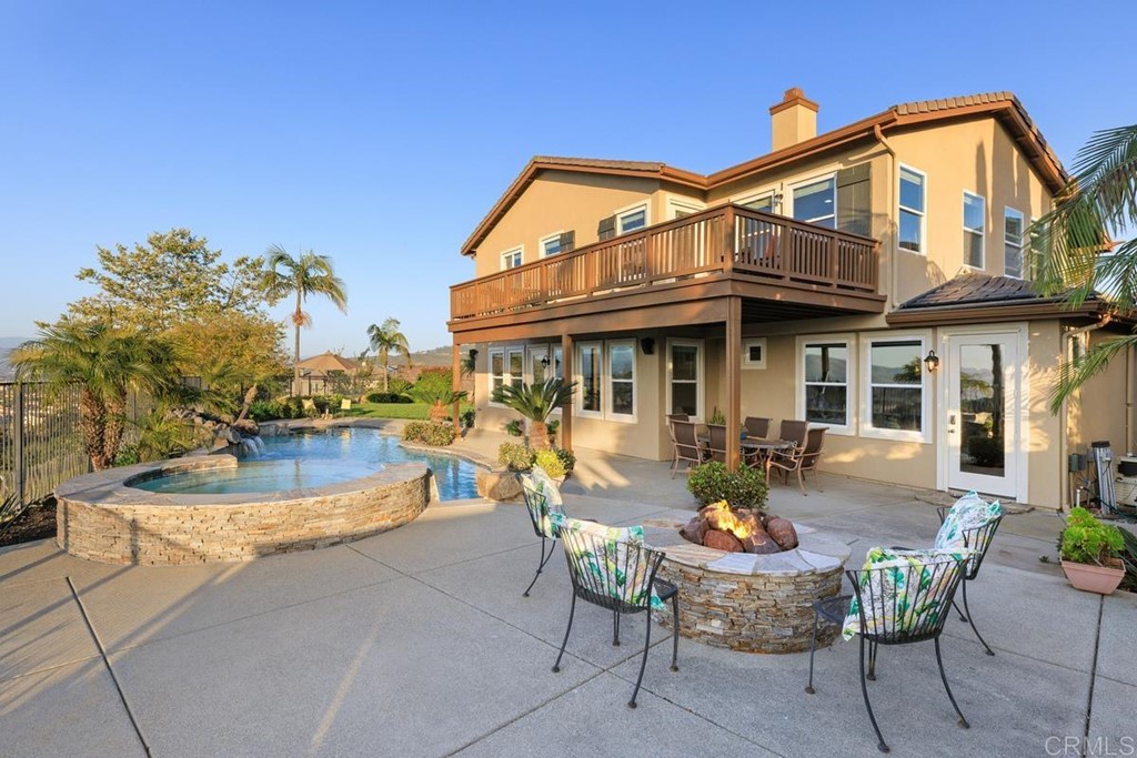 979 Canyon Heights San Marcos, CA 92078 - Photo 42 of 58 a view of a house with swimming pool and sitting area