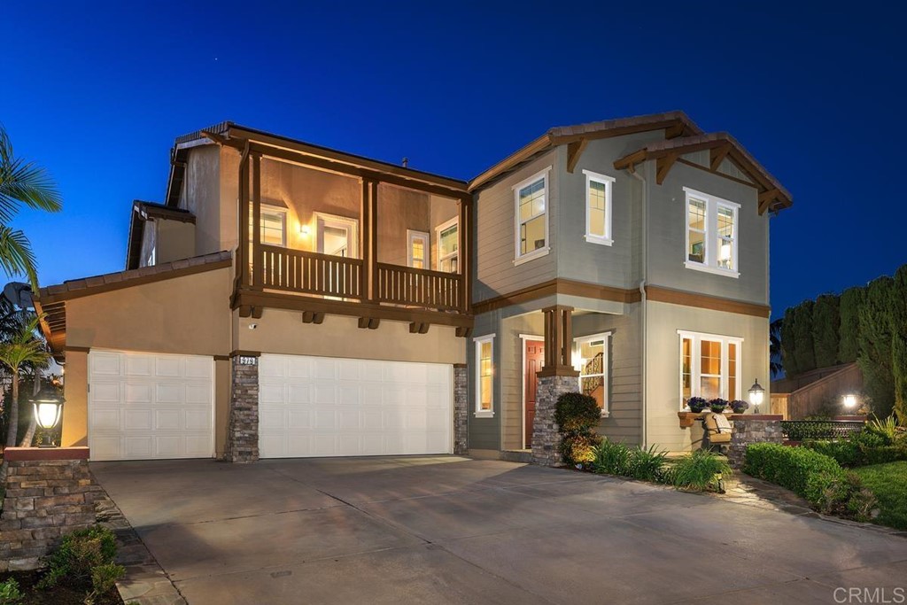 979 Canyon Heights San Marcos, CA 92078 - Photo 52 of 58 a front view of a house with a yard