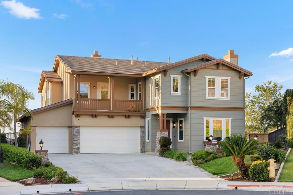 979 Canyon Heights San Marcos, CA 92078 - Photo 6 of 58 a front view of a house with yard