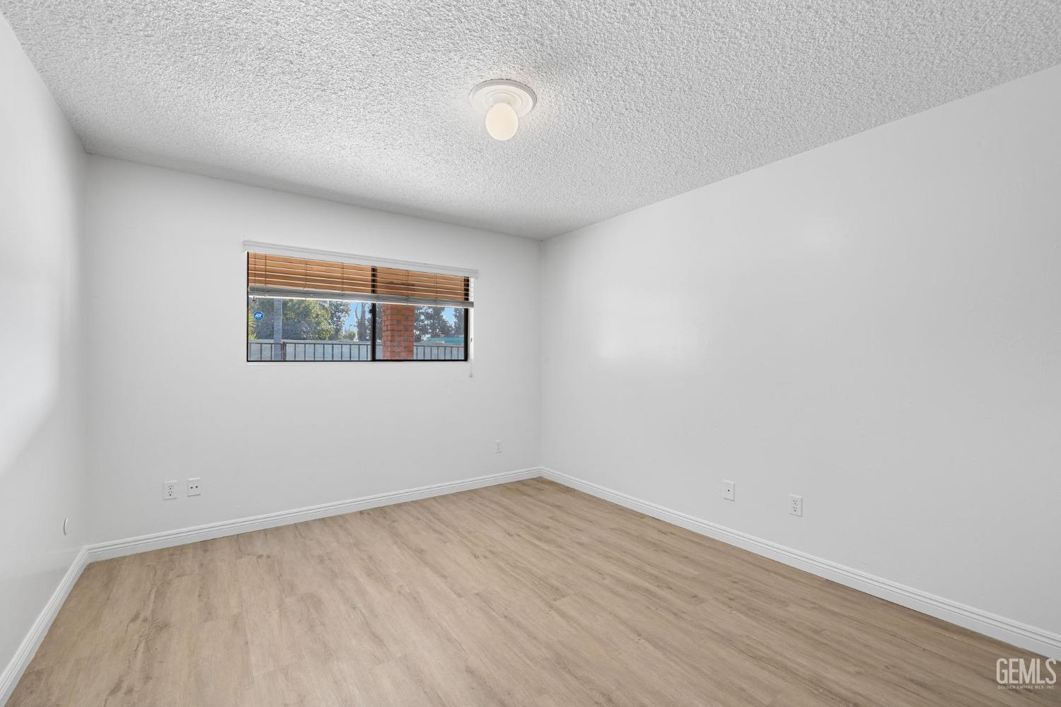 Undisclosed Address Bakersfield, CA 93309 - Photo 46 of 59 an empty room with a window