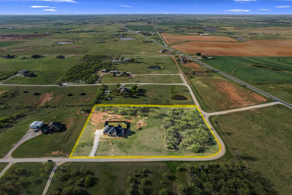 515 Sales Road Windthorst, TX 76389 - Photo 5 of 34 an aerial view of a residential houses with outdoor space