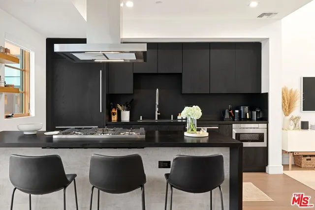 a outdoor space with a couch and chairs