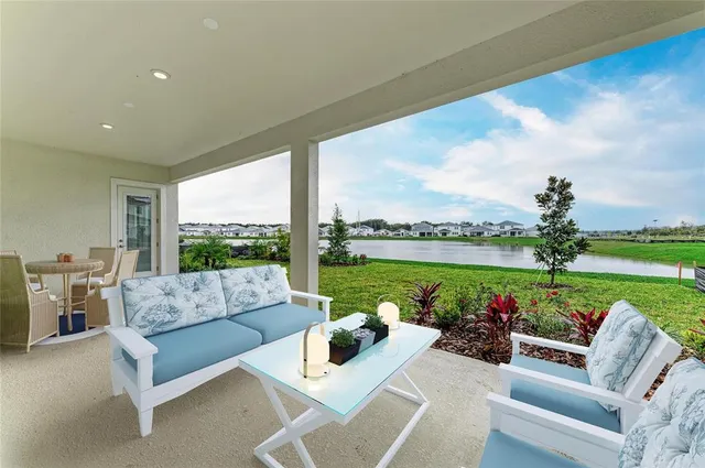 a outdoor living space with furniture and garden view