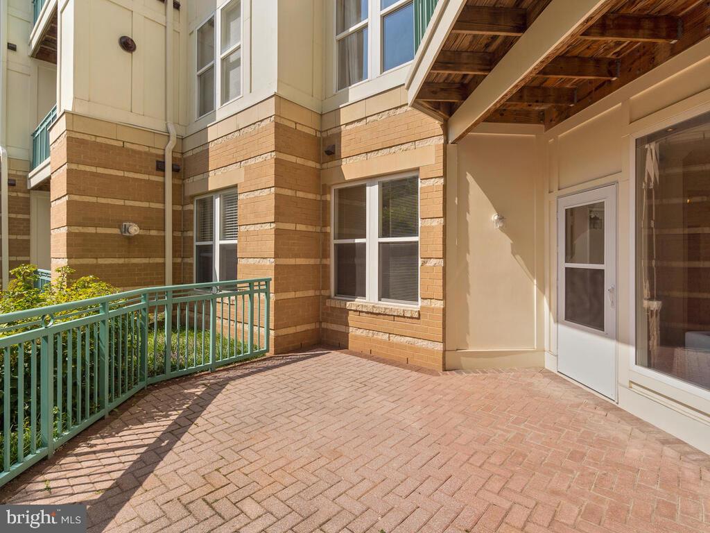 12001 Market Street, Unit 172 Reston, VA 20190 - Photo 4 of 39 Oversized patio overlooking the quiet courtyard
