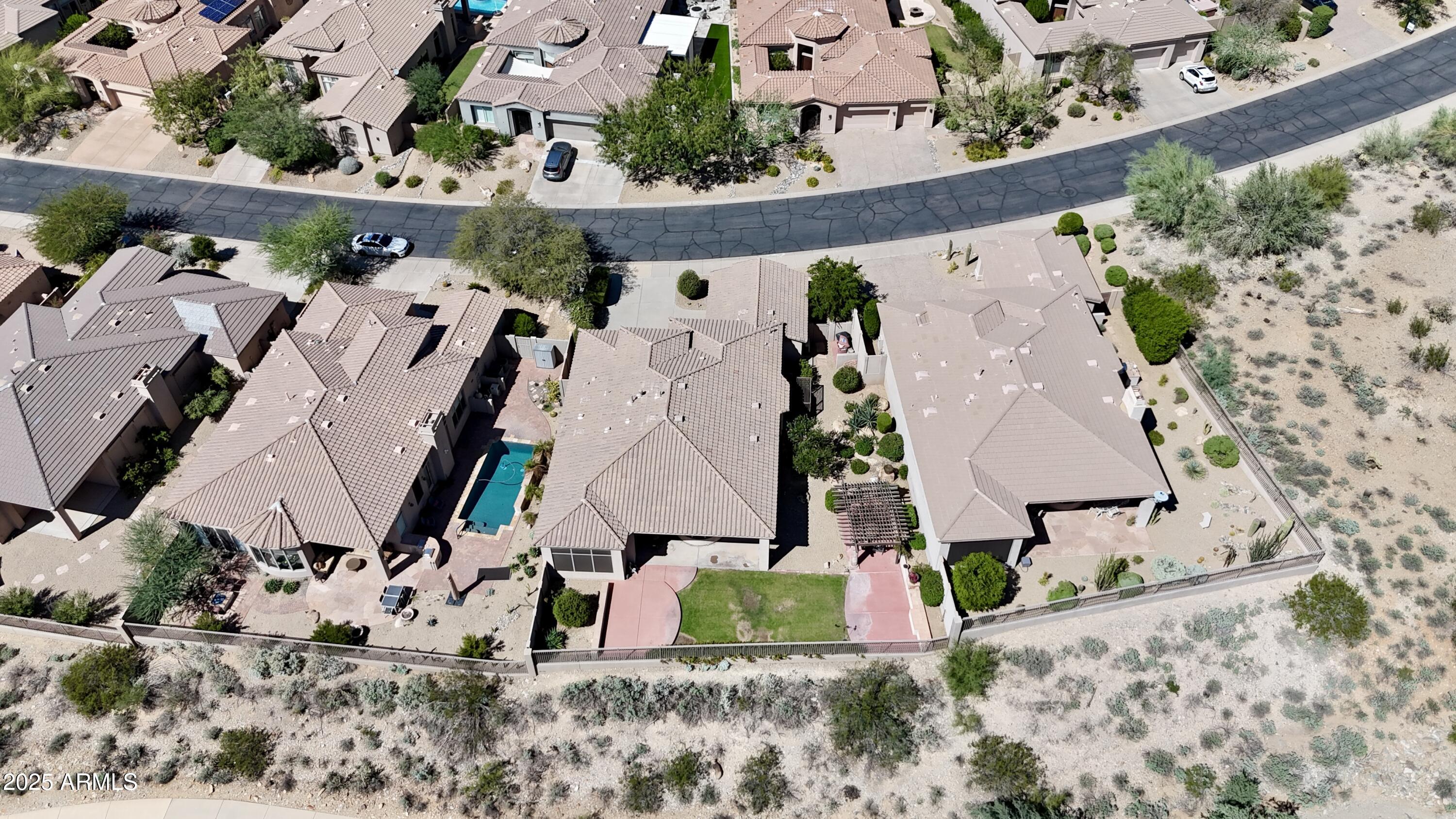 10637 East Blanche Drive Scottsdale, AZ 85255 - Photo 11 of 36 an aerial view of residential houses with outdoor space