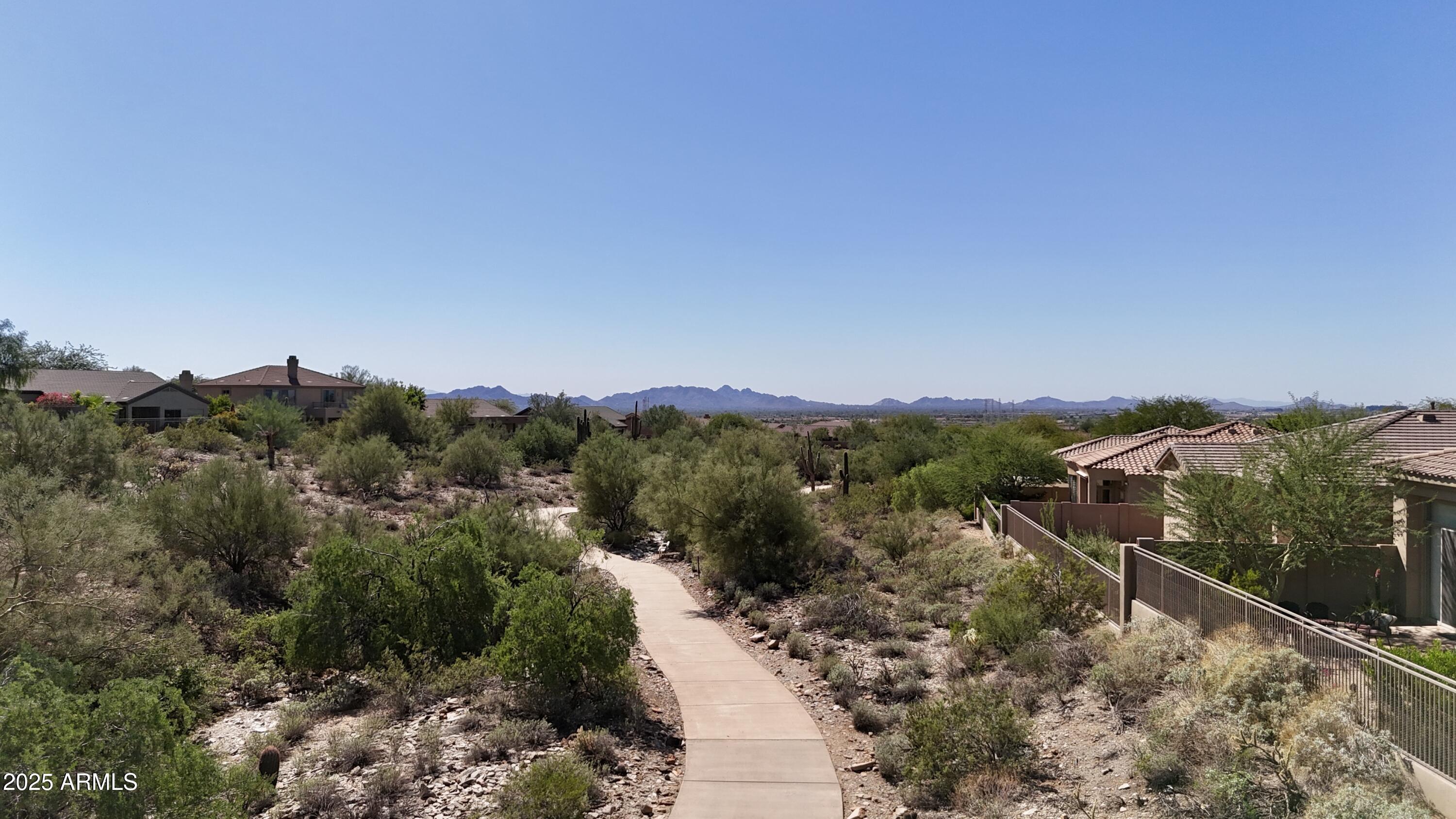 10637 East Blanche Drive Scottsdale, AZ 85255 - Photo 14 of 36 a view of a city with lush green forest
