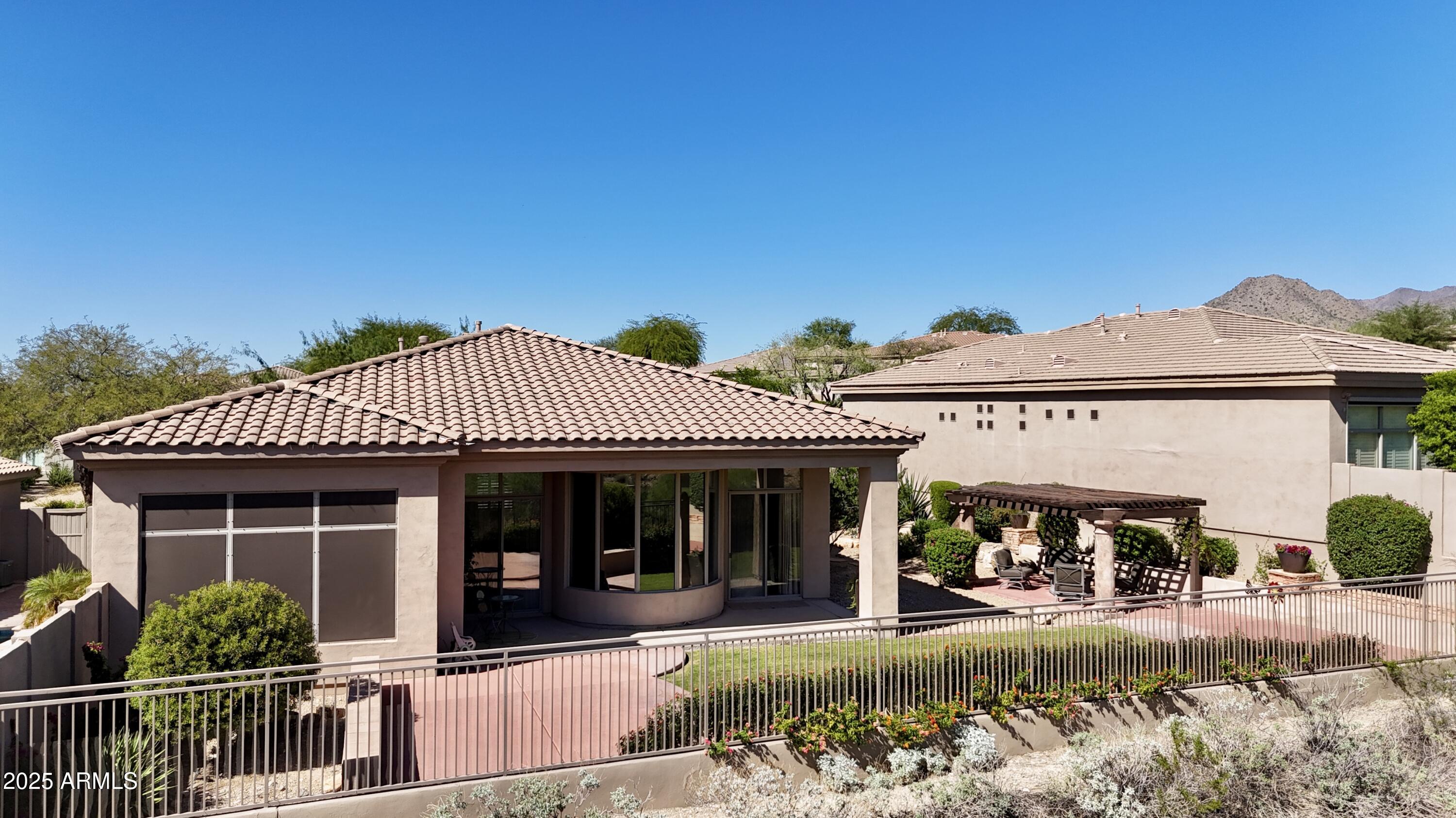 10637 East Blanche Drive Scottsdale, AZ 85255 - Photo 15 of 36 front view of a house with a porch
