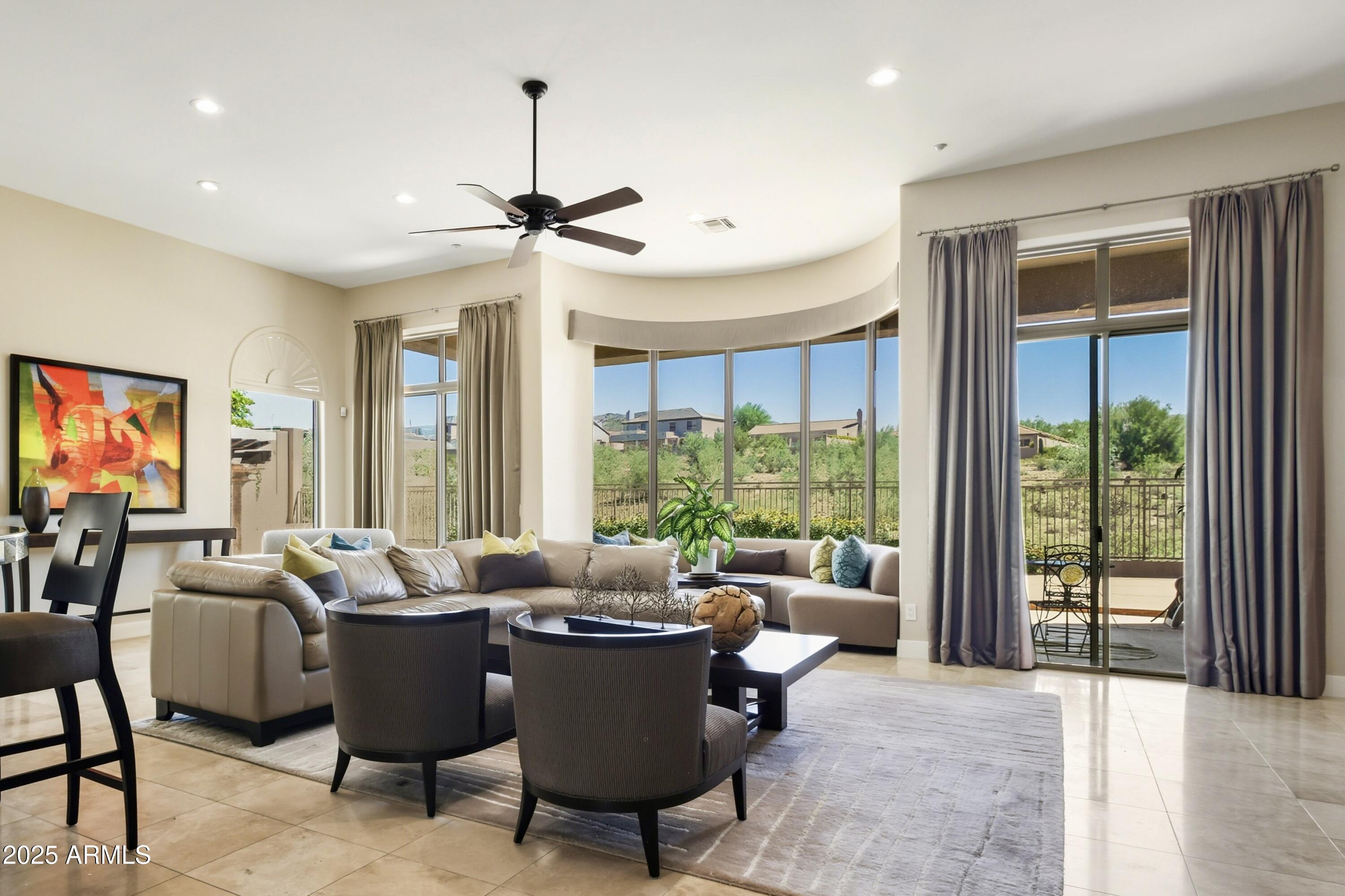 10637 East Blanche Drive Scottsdale, AZ 85255 - Photo 17 of 36 a view of a dining room with furniture window and outside view