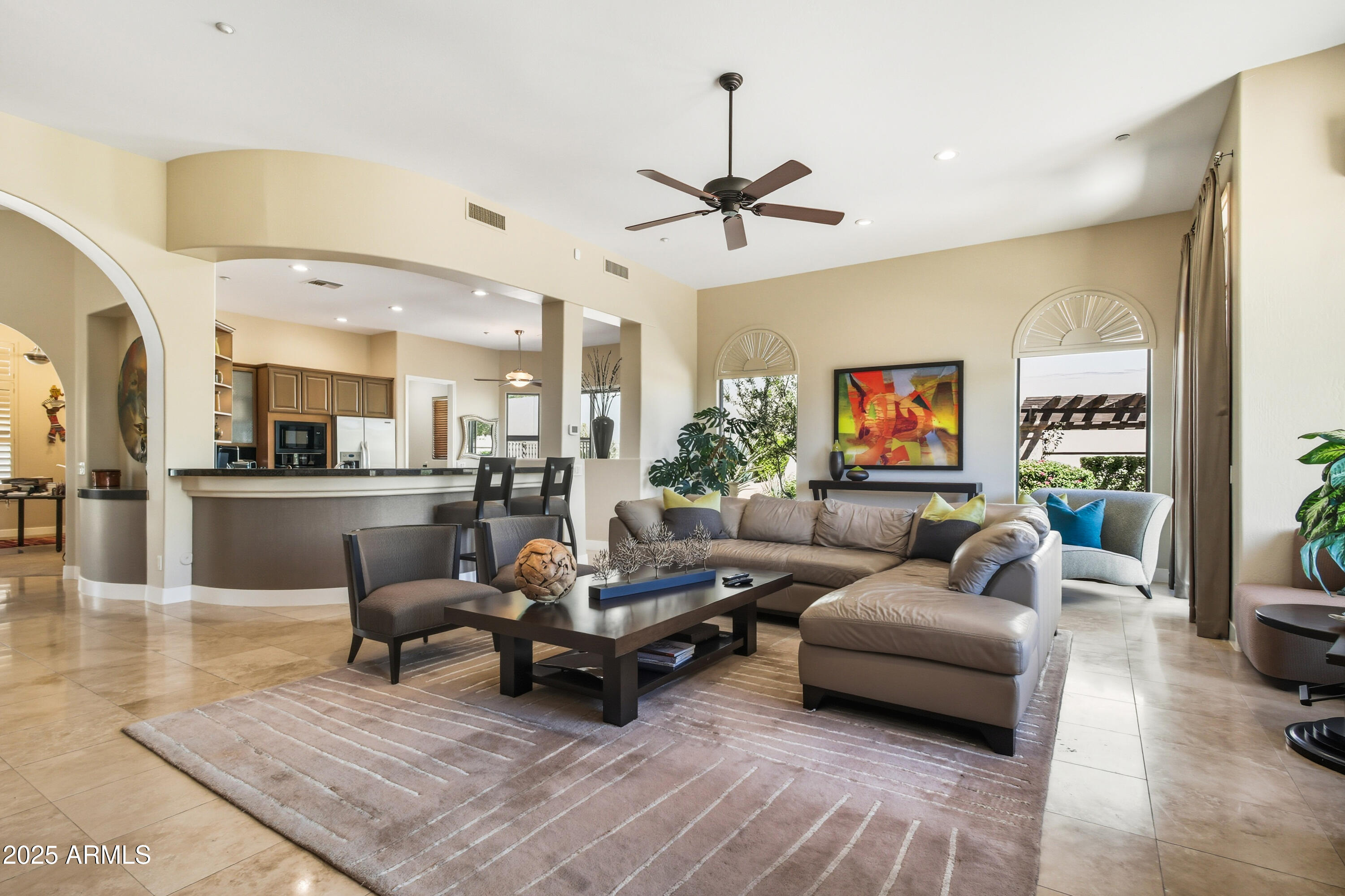 10637 East Blanche Drive Scottsdale, AZ 85255 - Photo 19 of 36 a living room with furniture and a view of kitchen