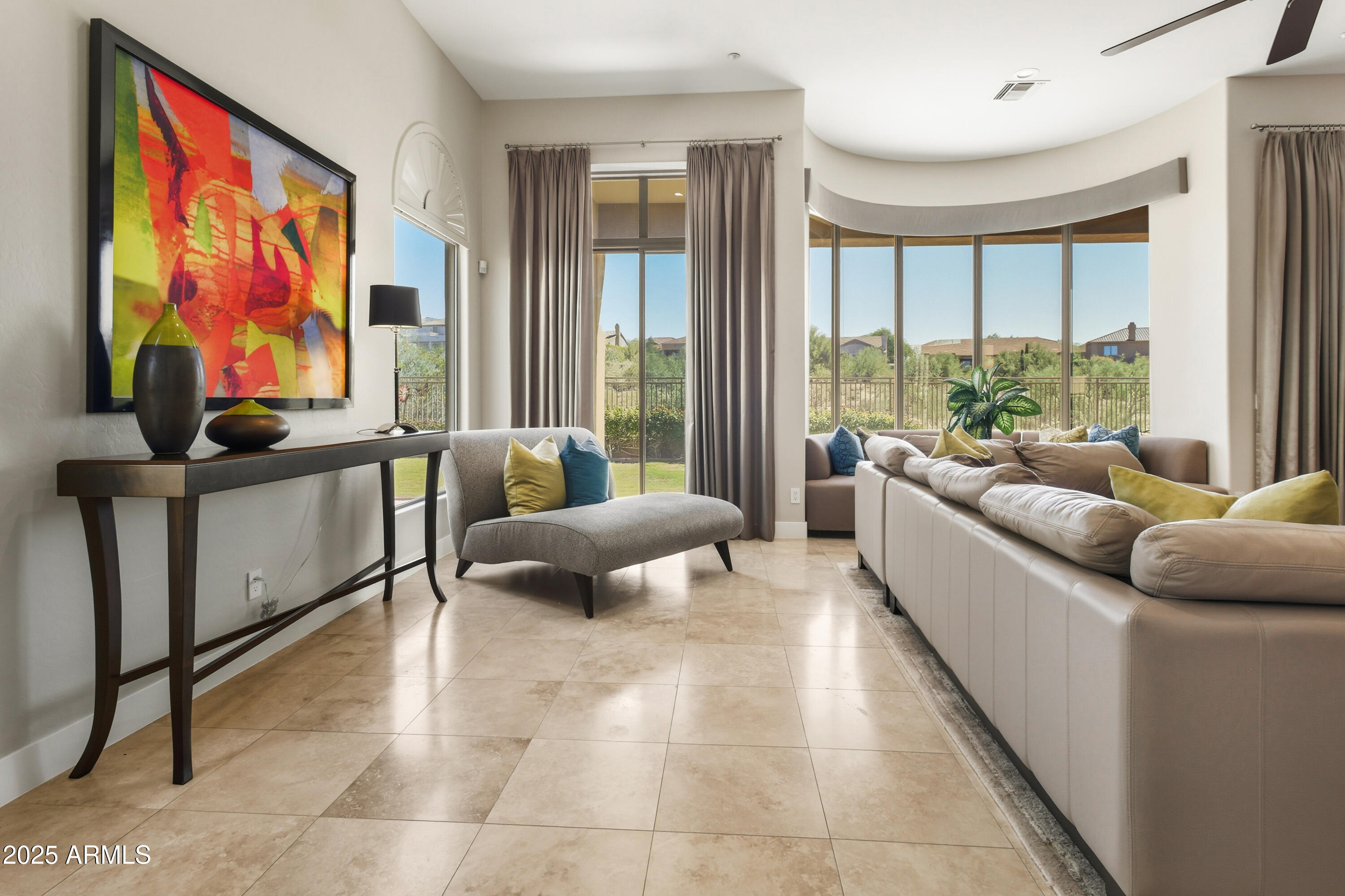 10637 East Blanche Drive Scottsdale, AZ 85255 - Photo 20 of 36 a living room with furniture and a flat screen tv