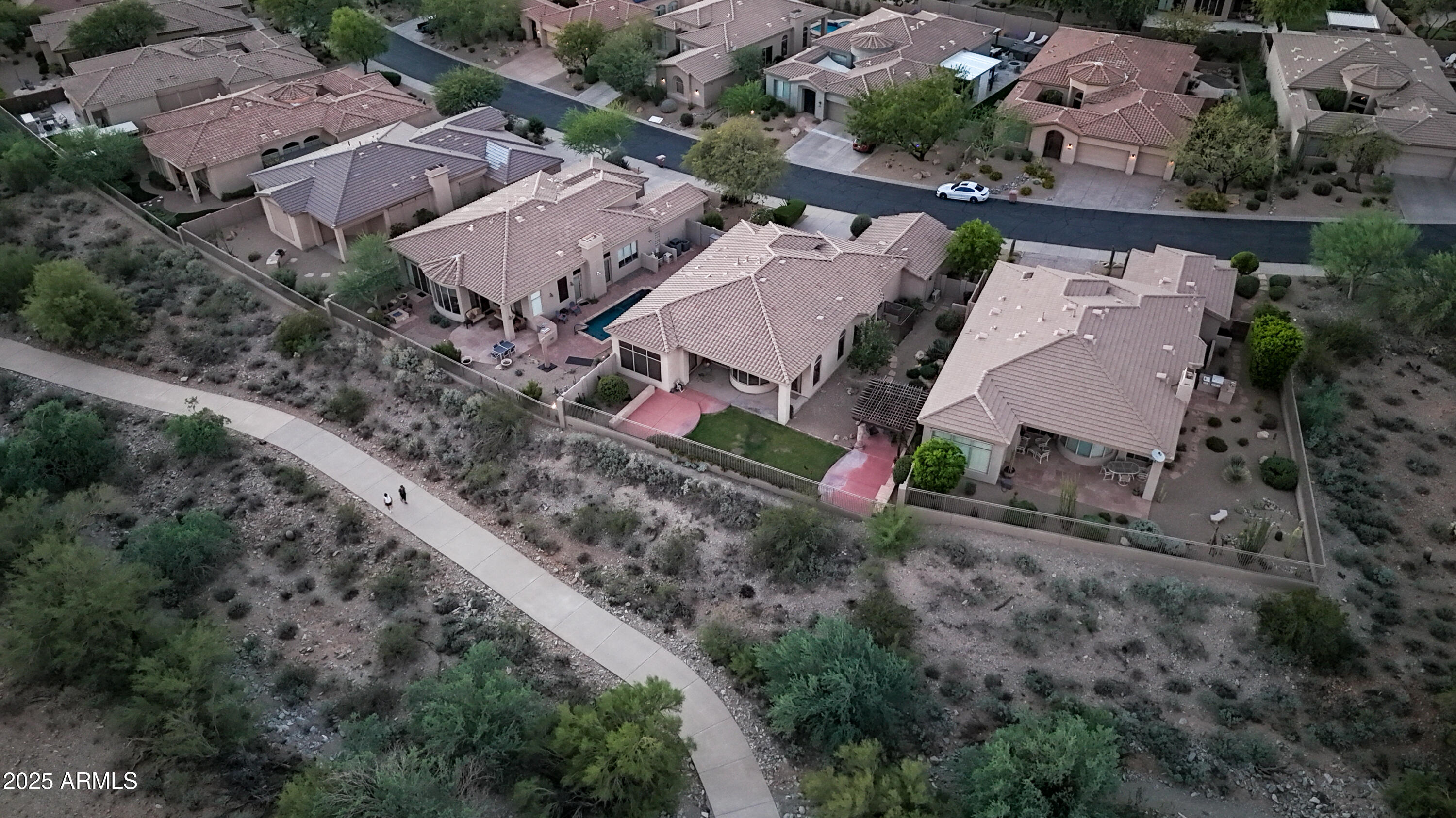 10637 East Blanche Drive Scottsdale, AZ 85255 - Photo 2 of 36 an aerial view of a house with a yard and trees