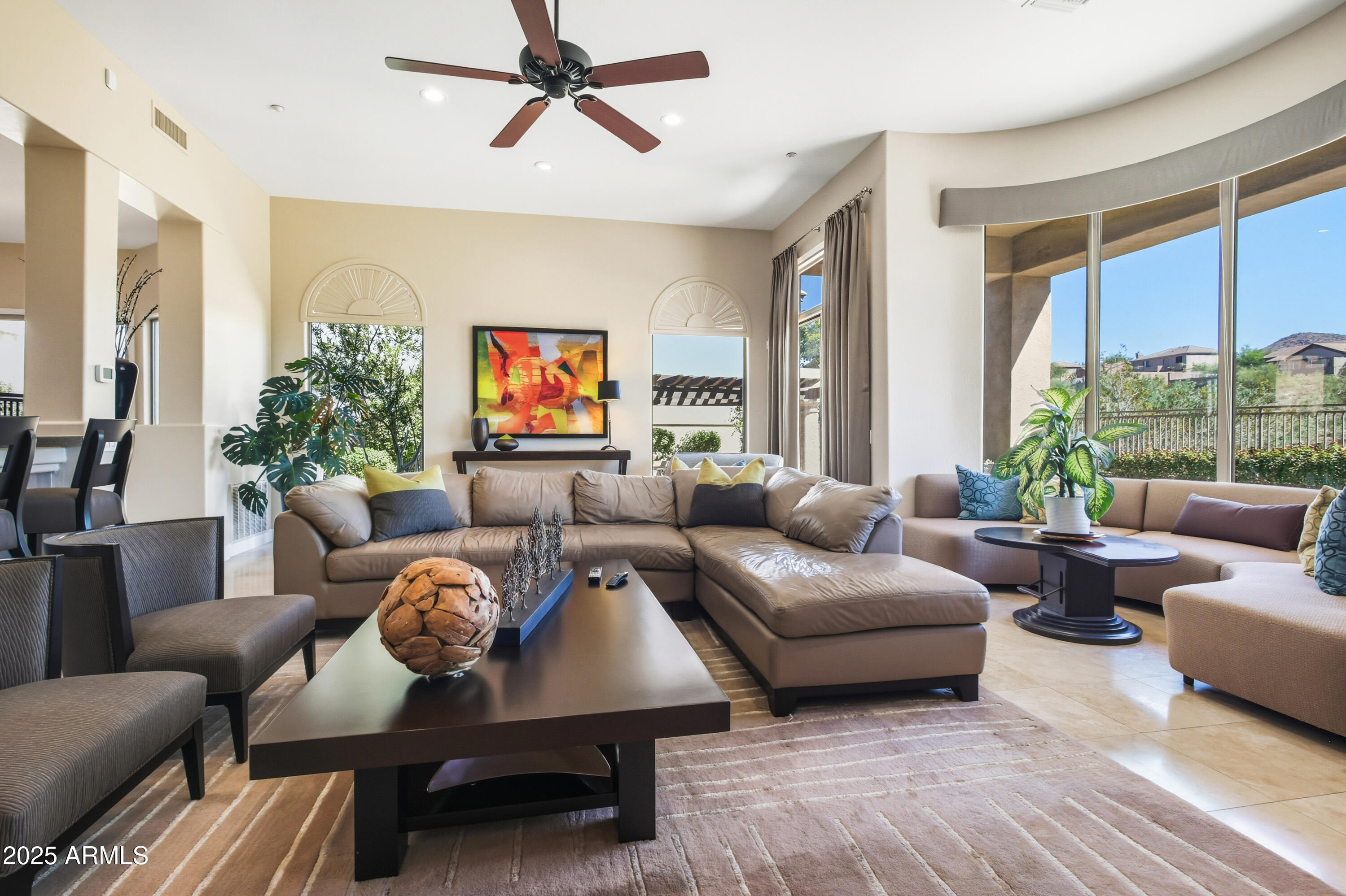 10637 East Blanche Drive Scottsdale, AZ 85255 - Photo 21 of 36 a living room with furniture and a large window