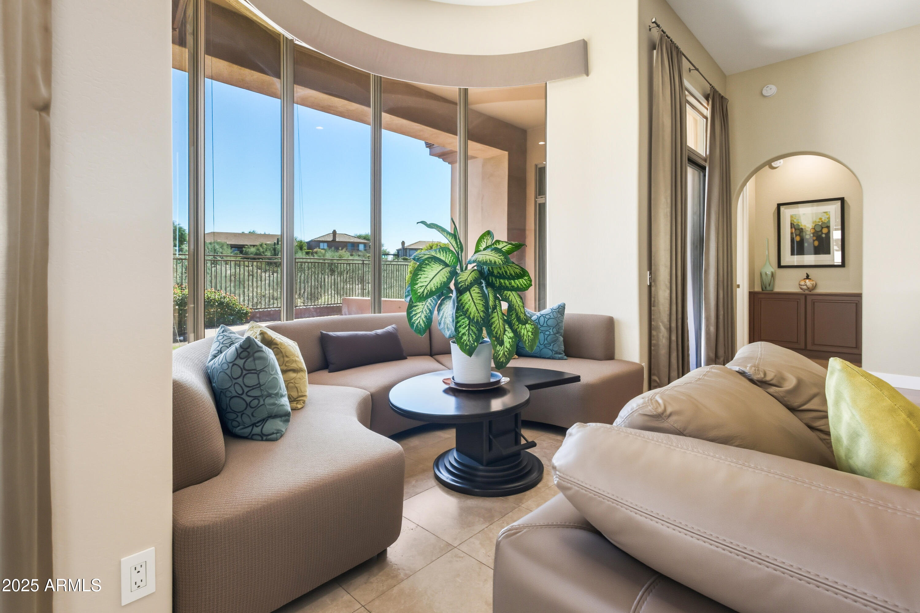 10637 East Blanche Drive Scottsdale, AZ 85255 - Photo 22 of 36 a living room with furniture and a large window