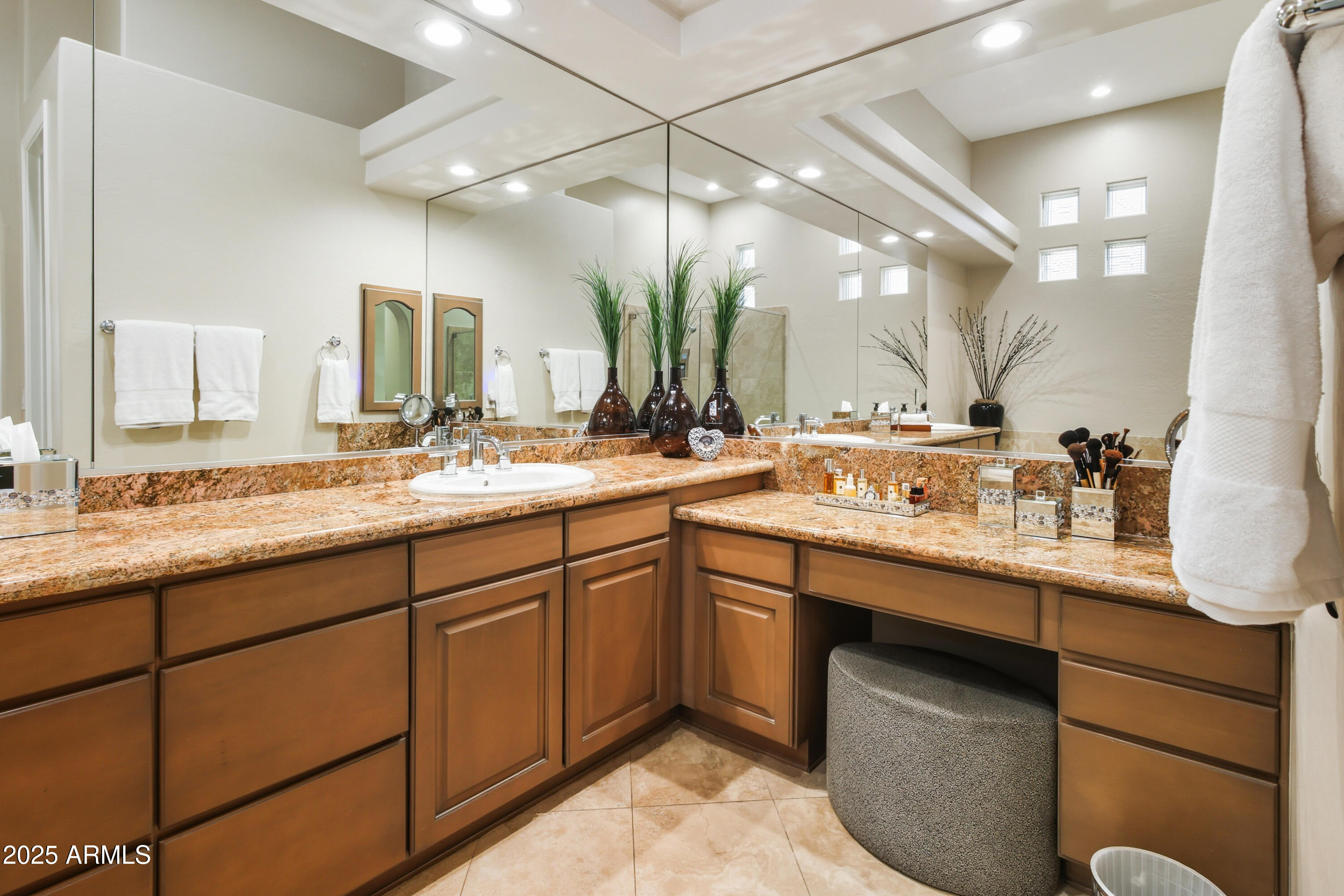 10637 East Blanche Drive Scottsdale, AZ 85255 - Photo 32 of 36 a bathroom with a double vanity sink and a mirror