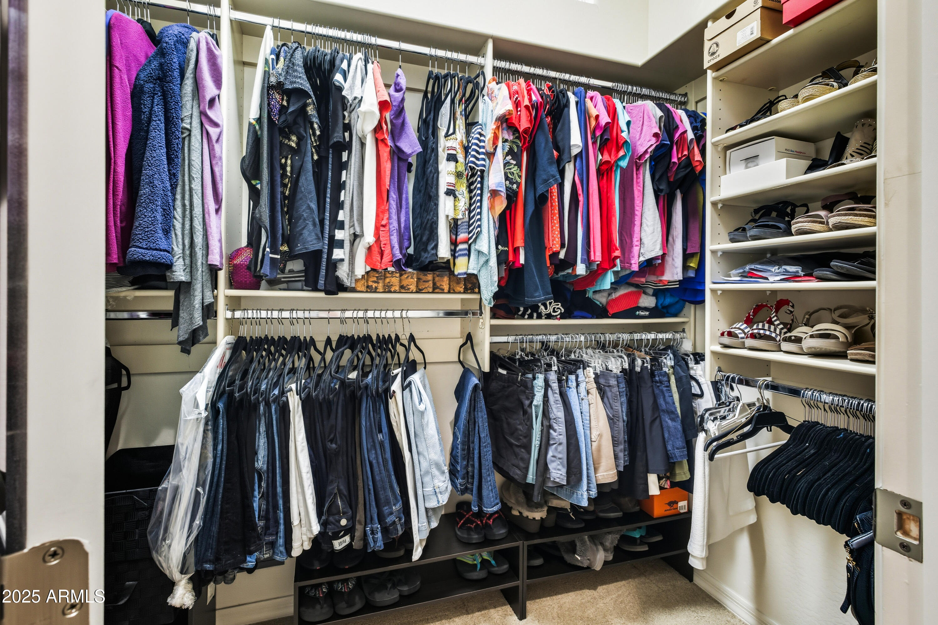10637 East Blanche Drive Scottsdale, AZ 85255 - Photo 33 of 36 a view of walk in closet with clothes