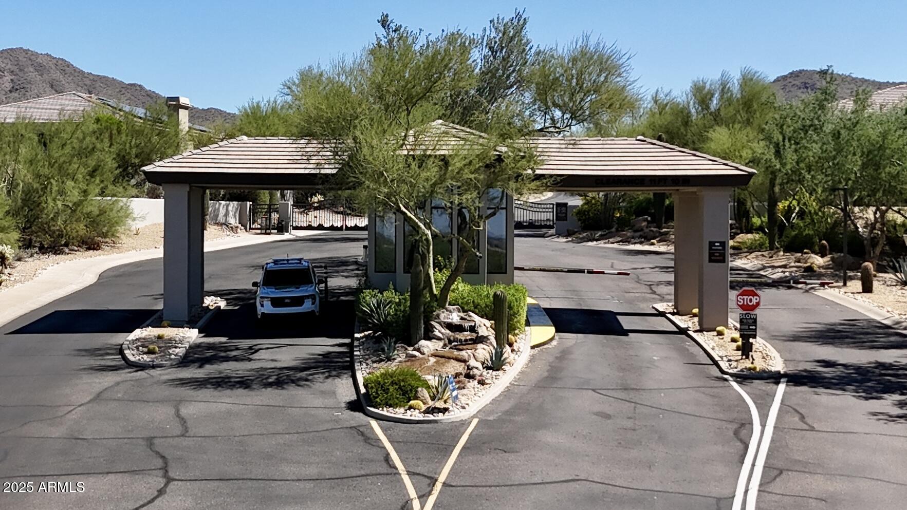 10637 East Blanche Drive Scottsdale, AZ 85255 - Photo 5 of 36 a backyard of a house with barbeque oven table and chairs