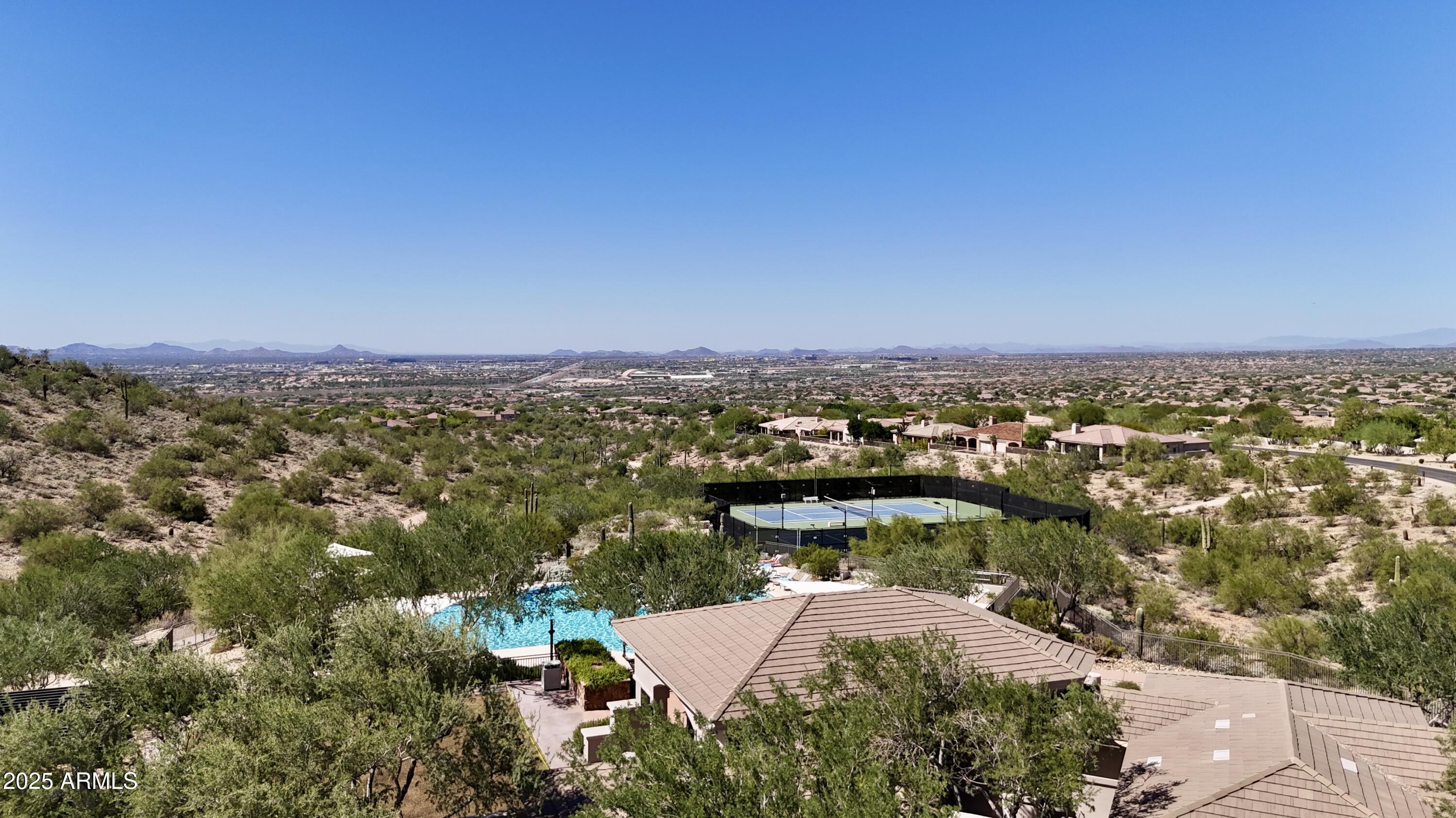 10637 East Blanche Drive Scottsdale, AZ 85255 - Photo 8 of 36 an aerial view of residential houses with outdoor space