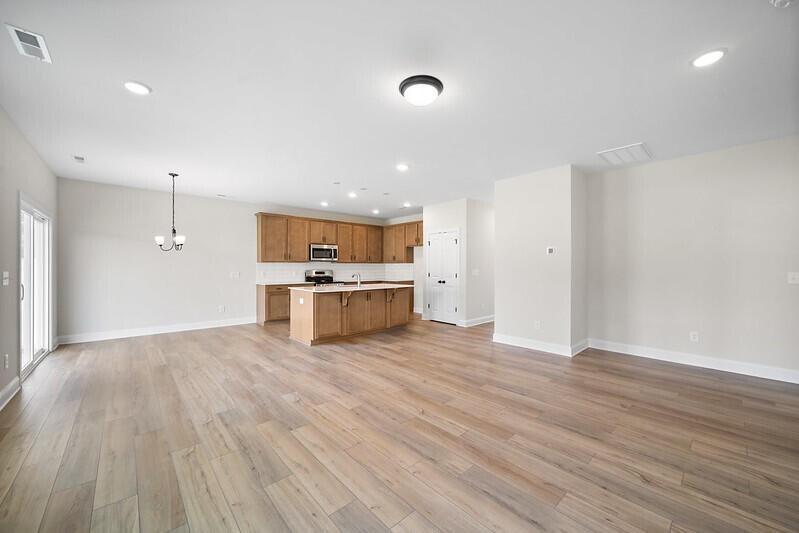 224 Palfrey Drive Ridgeville, SC 29472 - Photo 2 of 9 Cypress Family Room to Kitchen