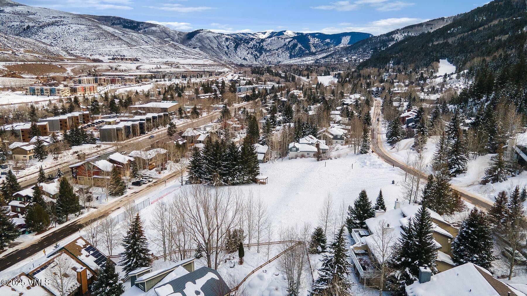 1289 Deer Boulevard, Unit A Eagle-Vail, CO 81620 - Photo 43 of 47 a view of building with mountain view