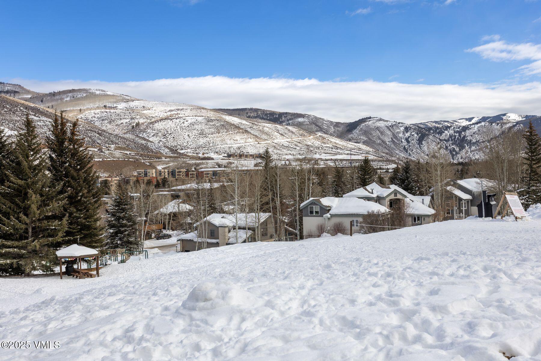 1289 Deer Boulevard, Unit A Eagle-Vail, CO 81620 - Photo 47 of 47 a view of a terrace with a snow