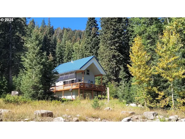 a view of outdoor space and front view of a house