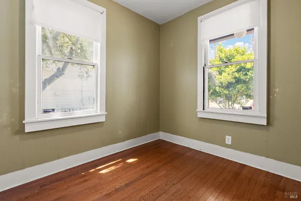 a view of a room that has a window in it