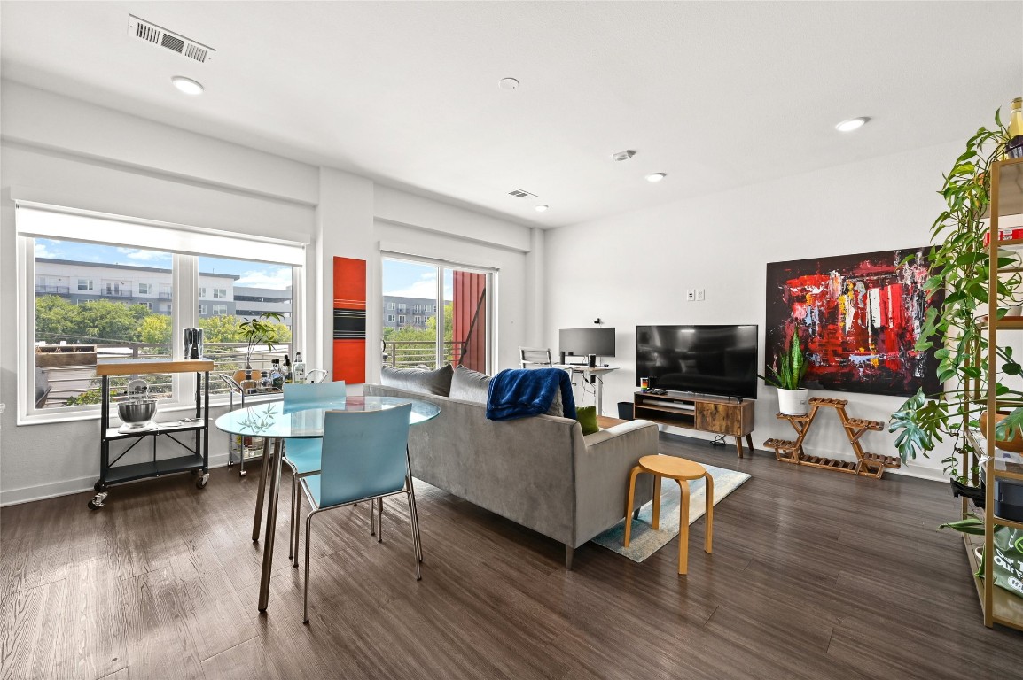 4361 South Congress Avenue, Unit 228 Austin, TX 78745 - Photo 3 of 20 a living room with furniture and a flat screen tv