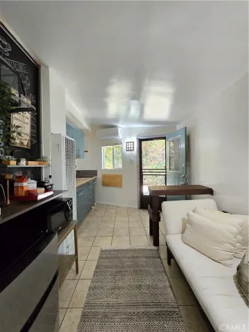 a hotel room with two beds and a large window