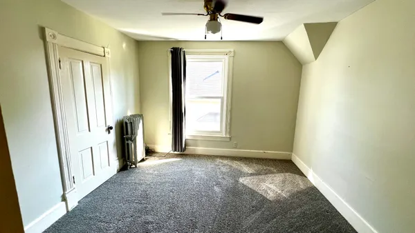 a view of hallway with windows