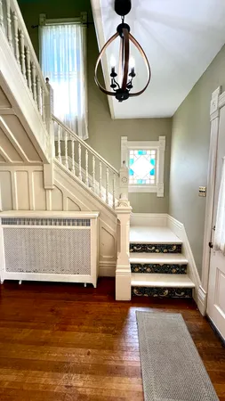 a view of staircase with large window