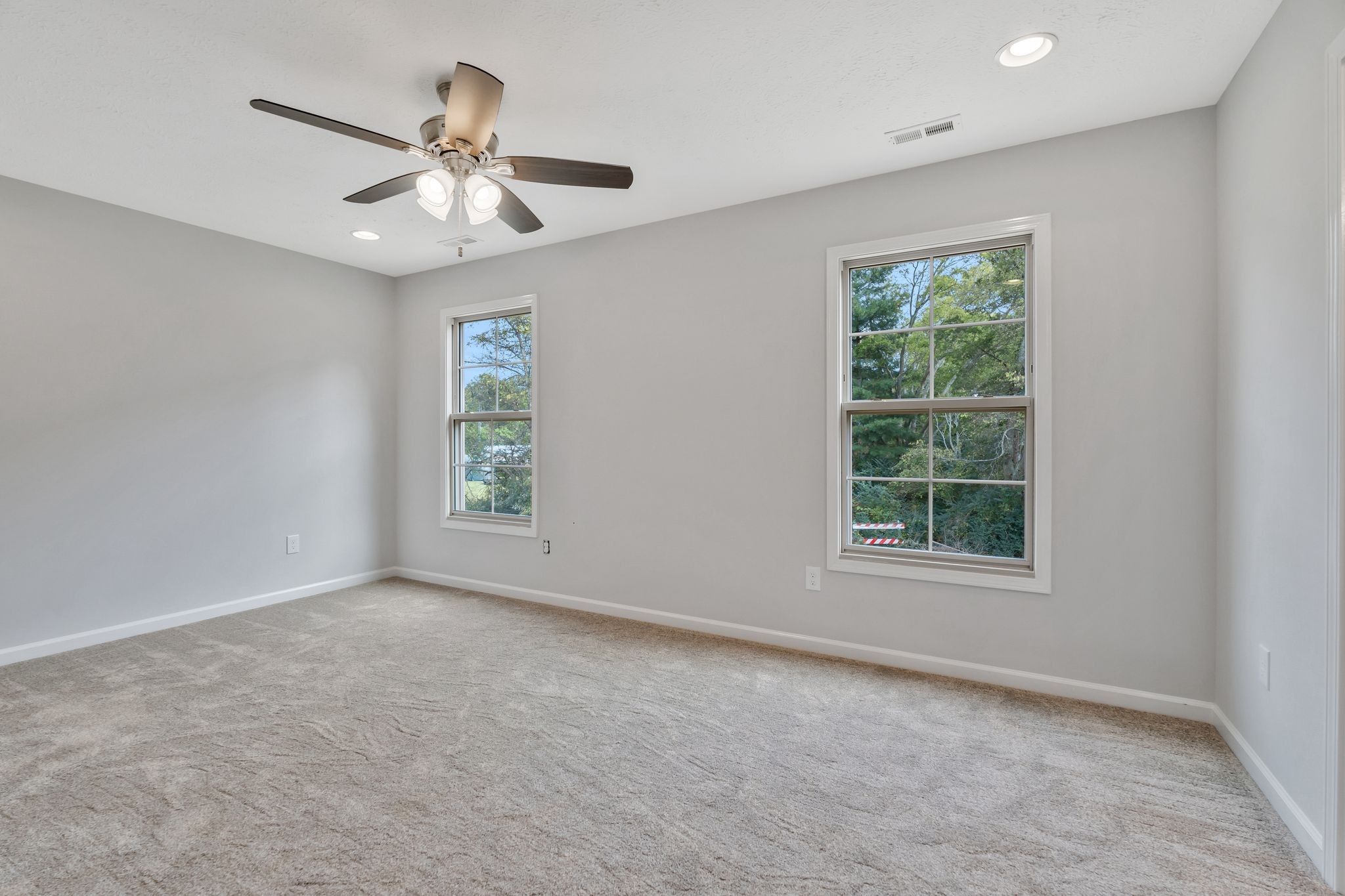 383 Doak Road, Unit 40 Manchester, TN 37355 - Photo 16 of 32 an empty room with a window and a fan