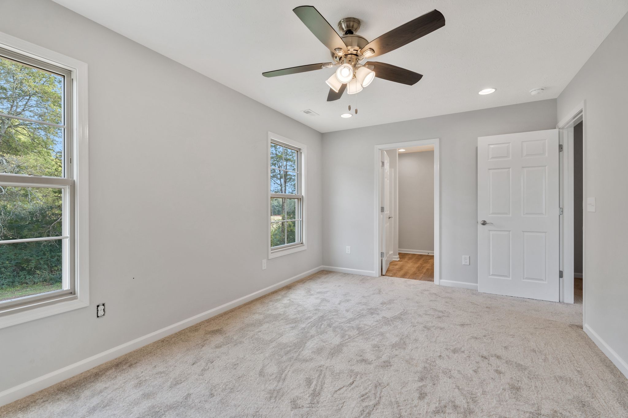 383 Doak Road, Unit 40 Manchester, TN 37355 - Photo 18 of 32 an empty room with windows and fan