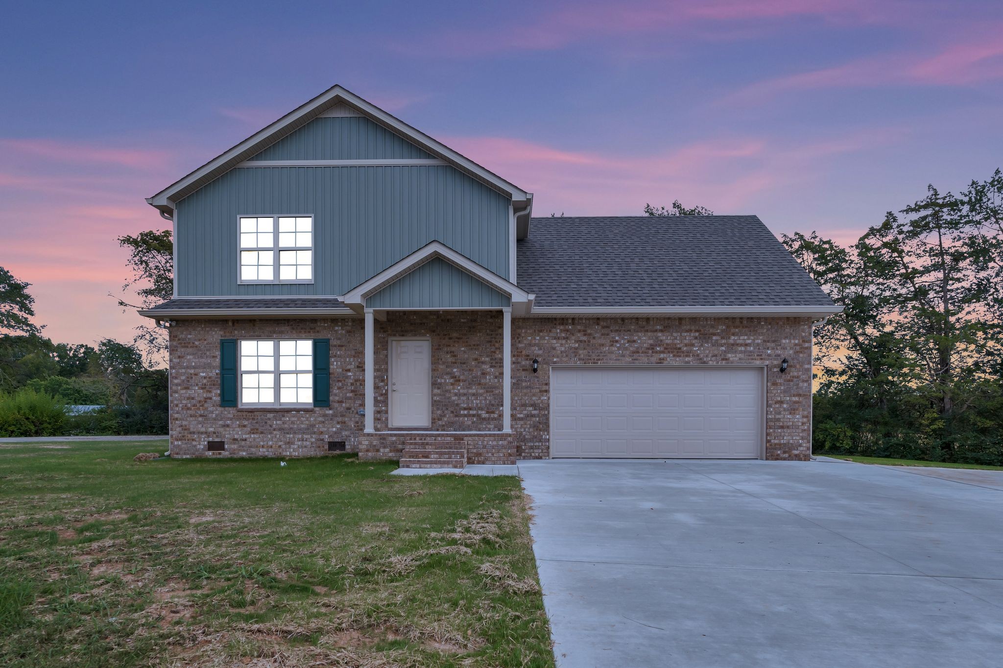 383 Doak Road, Unit 40 Manchester, TN 37355 - Photo 2 of 32 a front view of a house with garden