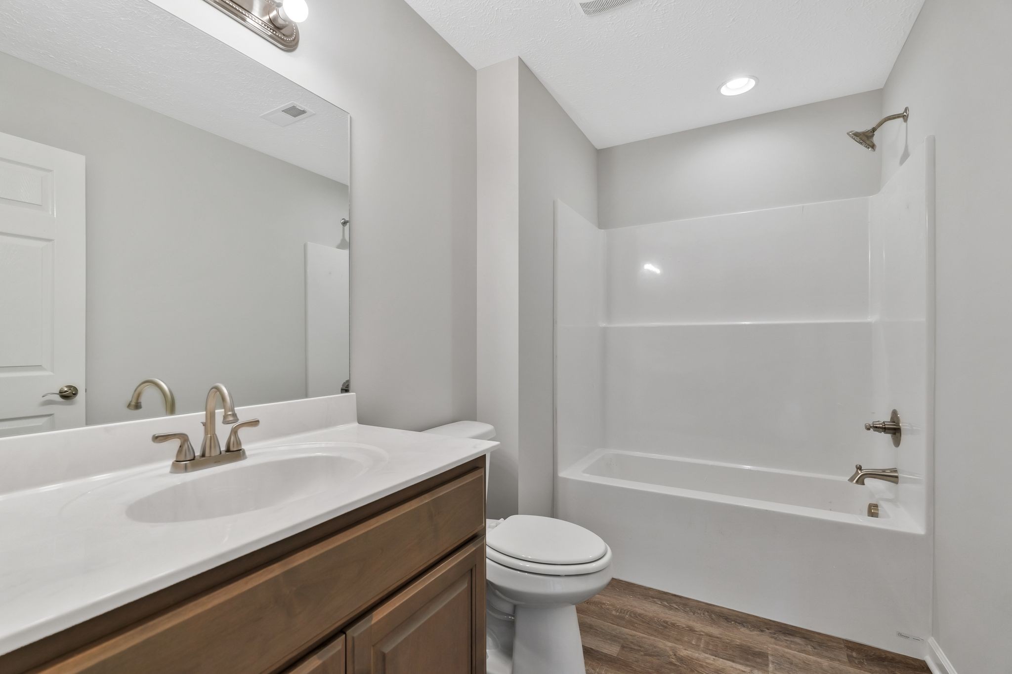 383 Doak Road, Unit 40 Manchester, TN 37355 - Photo 23 of 32 a bathroom with a sink a toilet and shower