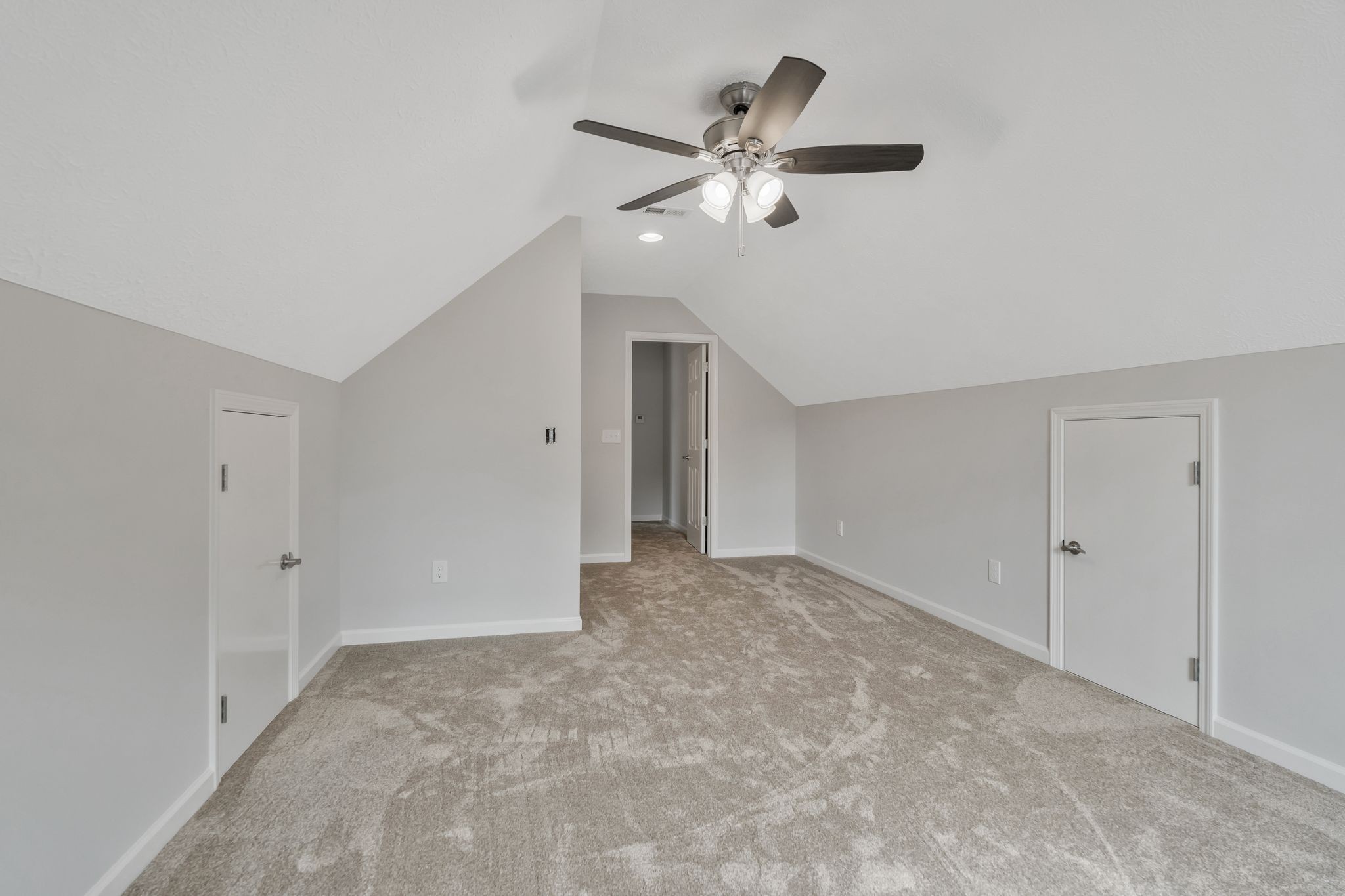 383 Doak Road, Unit 40 Manchester, TN 37355 - Photo 26 of 32 a view of an empty room with a ceiling fan